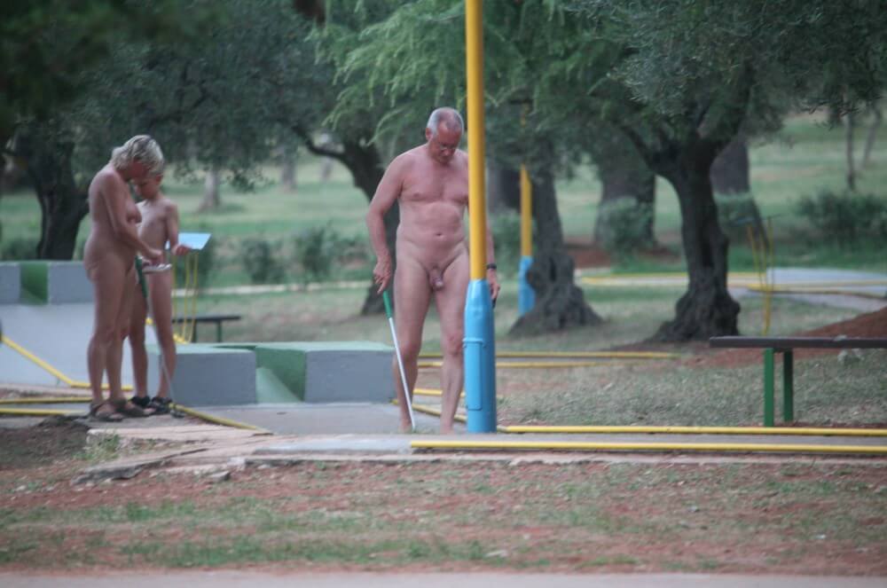 Mini-Golf Nude Participants pics - Nature fills the naked body with energy and inspiration