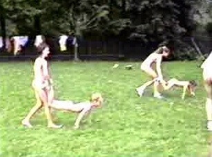 A nudist gathering at the stadium and sports - The Cult of Nudity Is Open to All