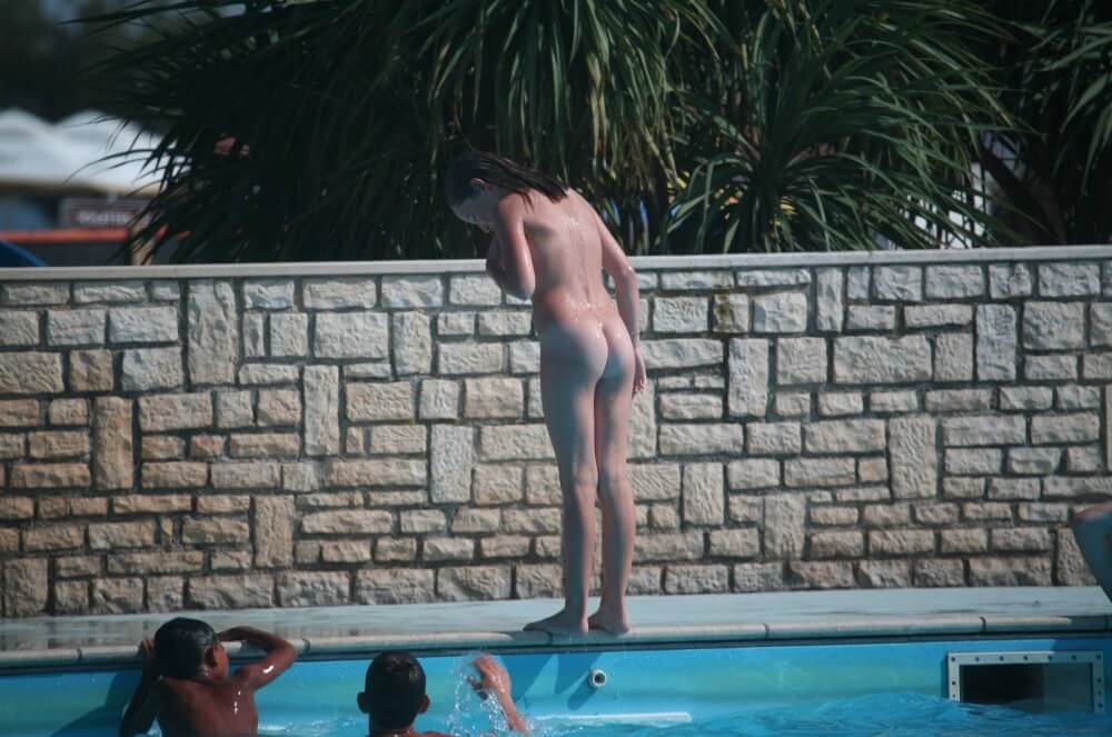 Naturist Pool-Side Singles pics - A nudist values simplicity in life and naturalness in expression