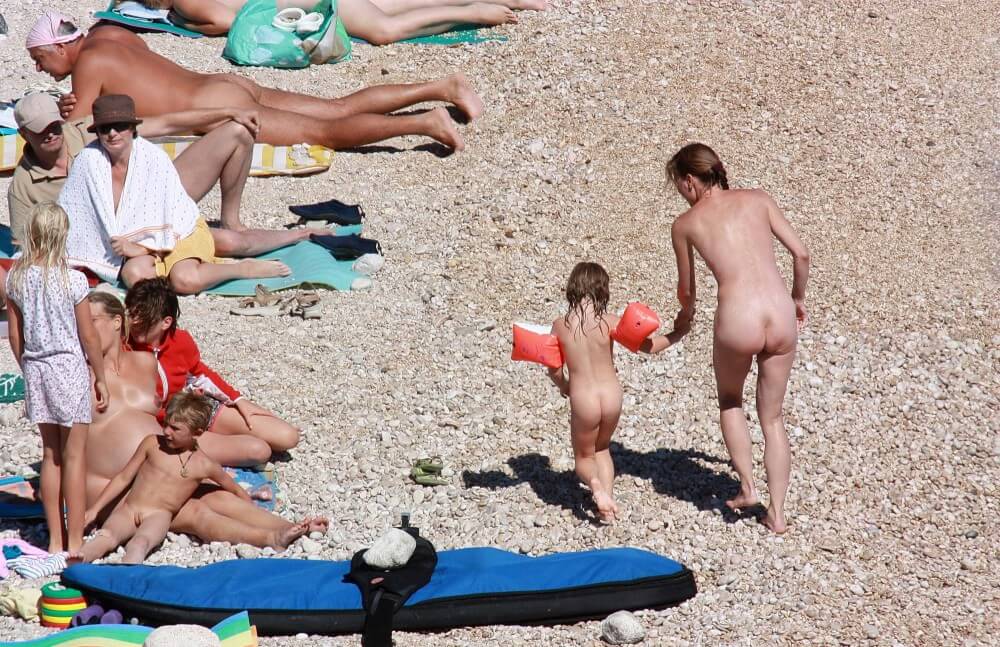 Orange Floaty Safety First Naturist pics - Pure naturism teaches us to accept ourselves and others without judgment or criticism